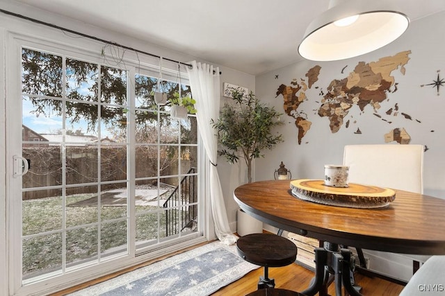 dining room with hardwood / wood-style floors