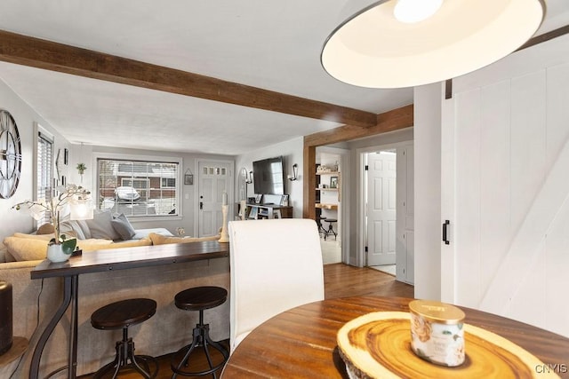 dining space featuring hardwood / wood-style floors