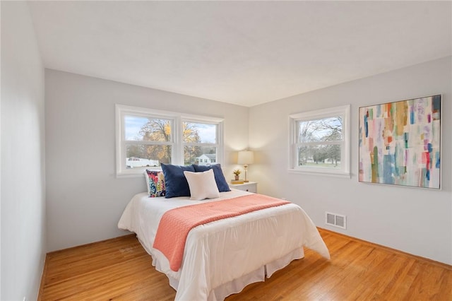 bedroom featuring wood-type flooring