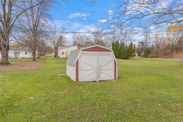 view of outdoor structure with a lawn