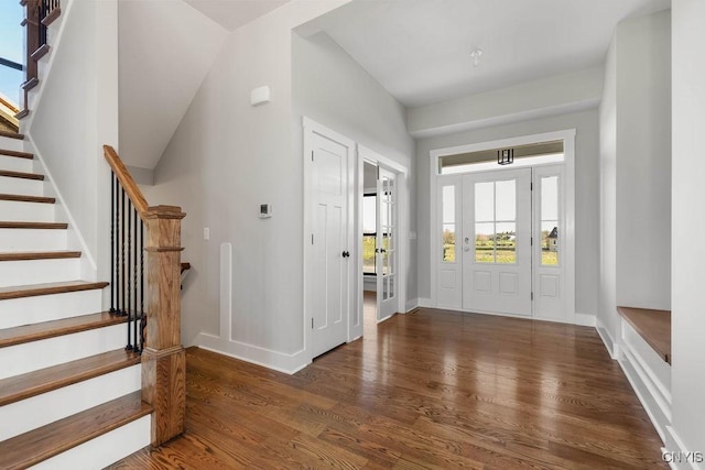 foyer with dark wood-type flooring