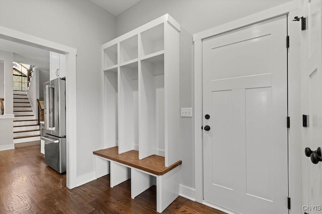 mudroom with dark wood-type flooring