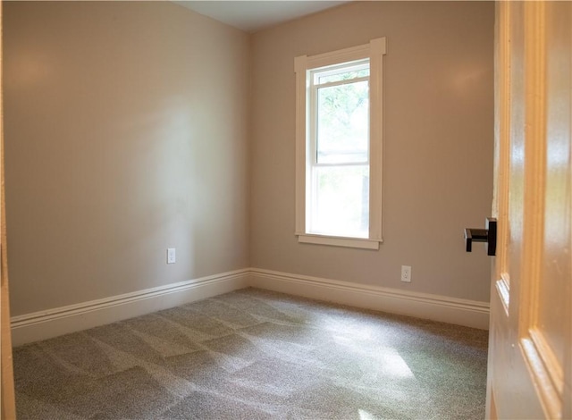 unfurnished room with carpet floors