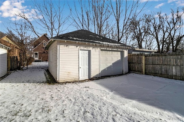 view of snow covered garage