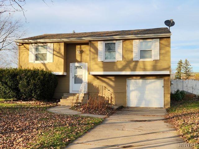 bi-level home with a garage