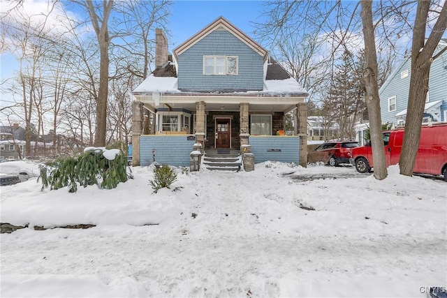 bungalow-style home with a porch