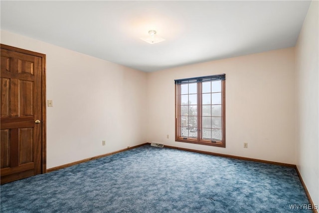 empty room featuring carpet floors