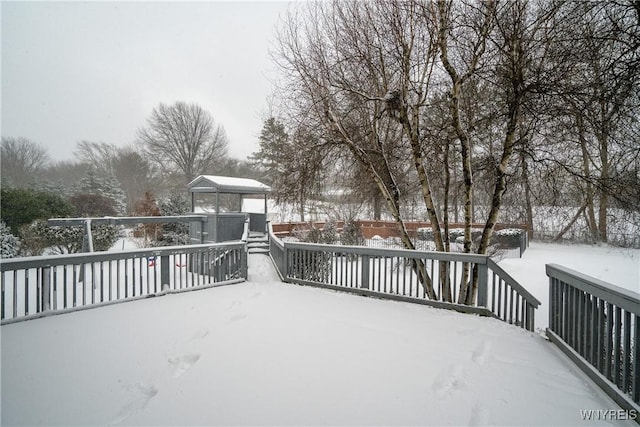 view of snow covered deck