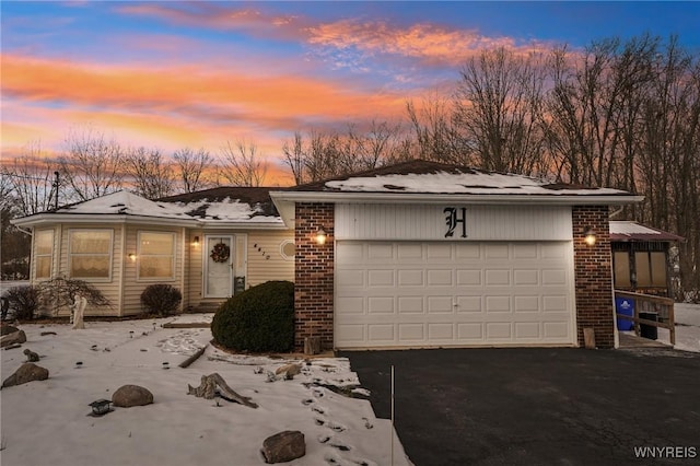 view of front of home with a garage