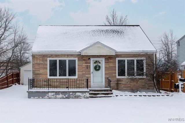 view of front facade with a garage and an outdoor structure