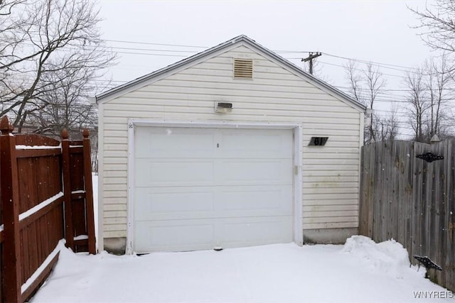 view of snow covered garage