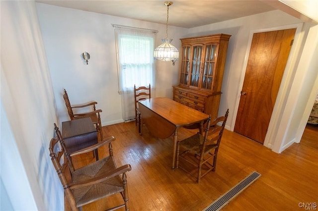 dining space featuring light hardwood / wood-style flooring