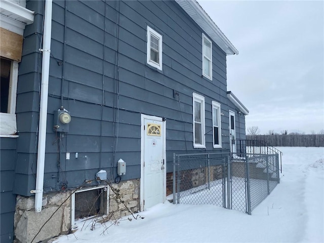 view of snow covered property