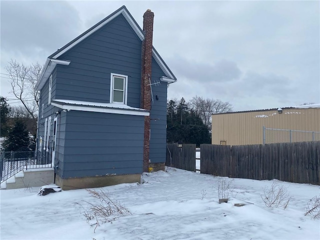 view of snow covered property