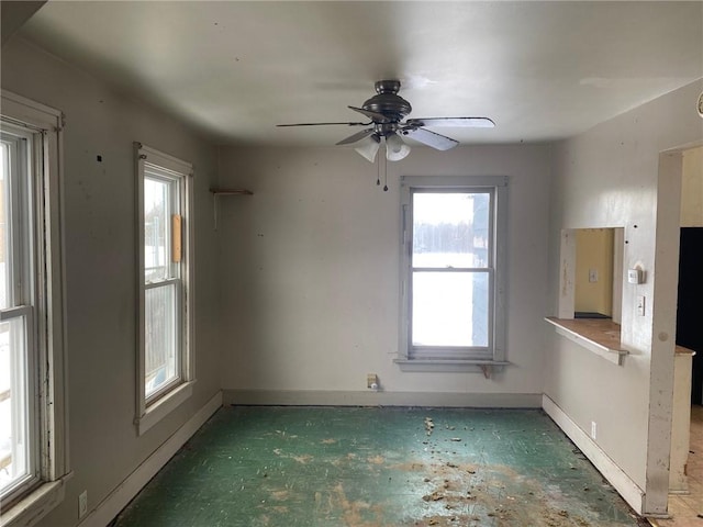 empty room featuring ceiling fan