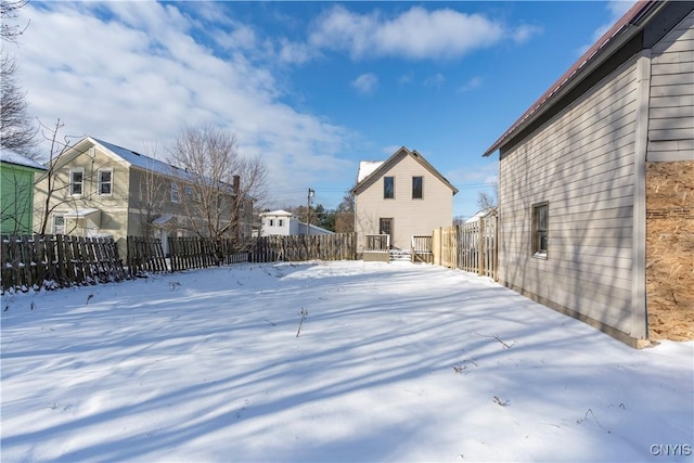 view of yard covered in snow