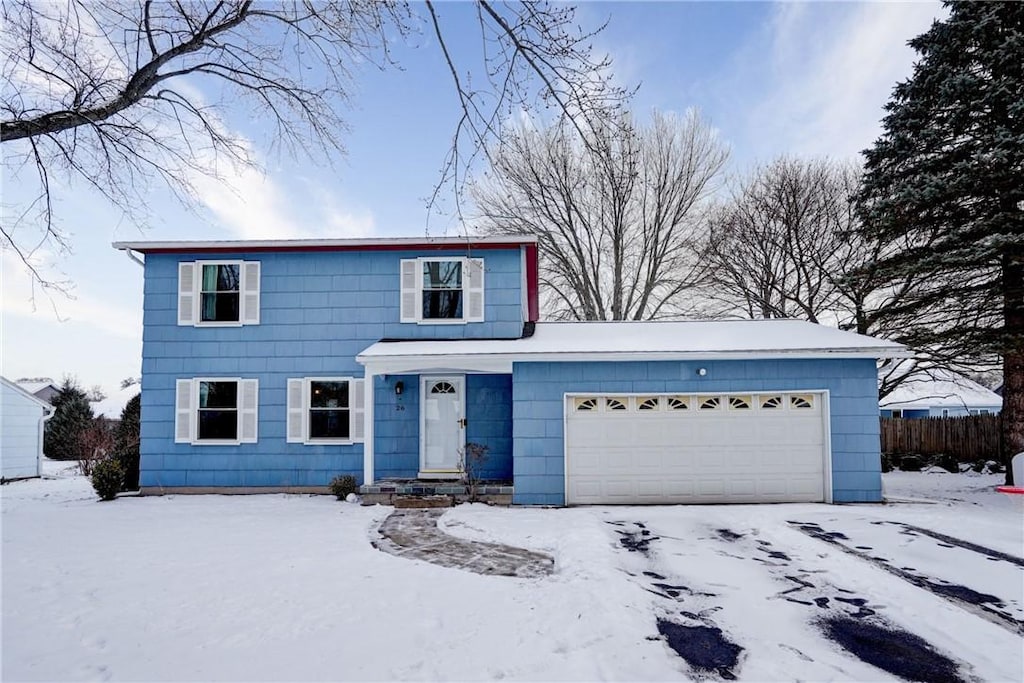 view of property featuring a garage