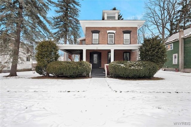 italianate-style house featuring covered porch