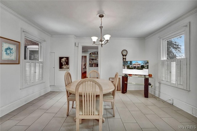 tiled dining space with a chandelier and crown molding