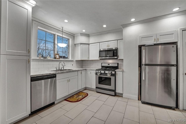 kitchen featuring sink, white cabinets, and appliances with stainless steel finishes