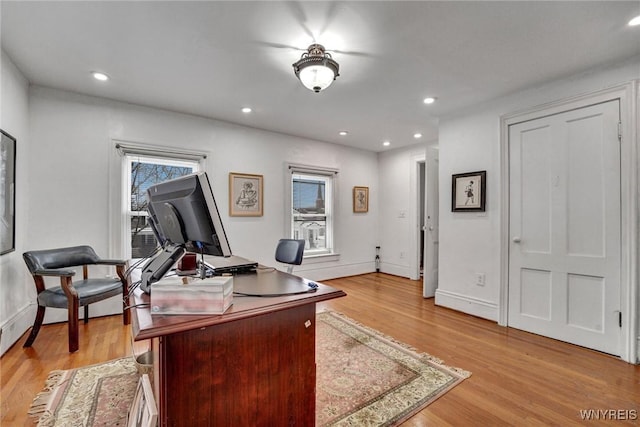 home office featuring light hardwood / wood-style floors