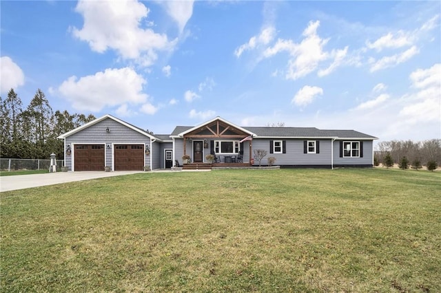 ranch-style house featuring a porch, a front lawn, and a garage