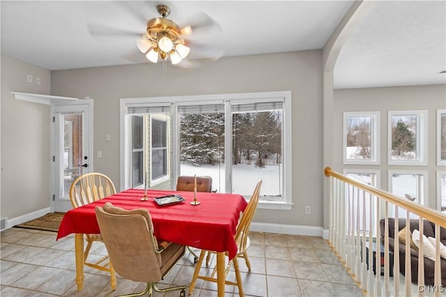 dining room featuring ceiling fan and light tile patterned floors