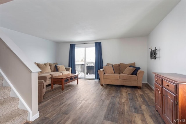 living room featuring dark wood-type flooring