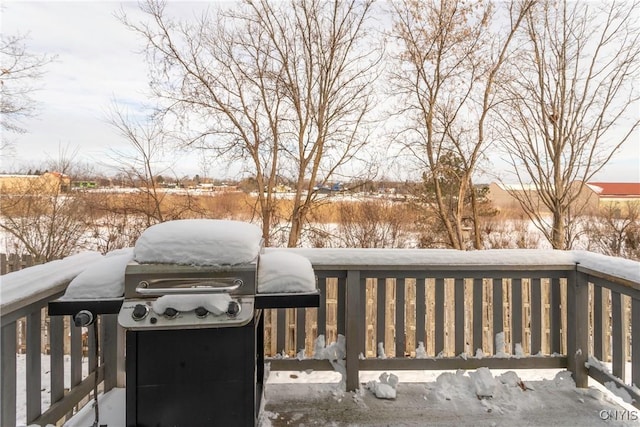 view of snow covered deck