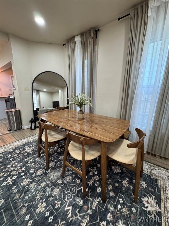 dining room with hardwood / wood-style floors