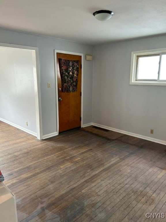 entrance foyer featuring dark wood-type flooring