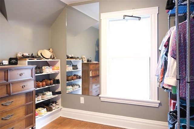 spacious closet featuring hardwood / wood-style flooring