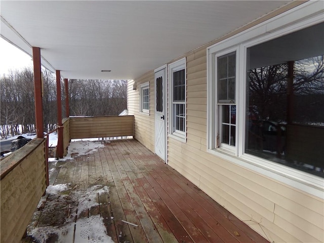 view of snow covered deck