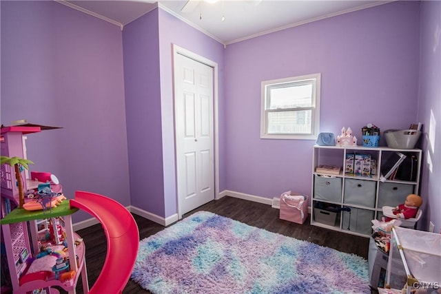 bedroom featuring crown molding and dark wood-type flooring