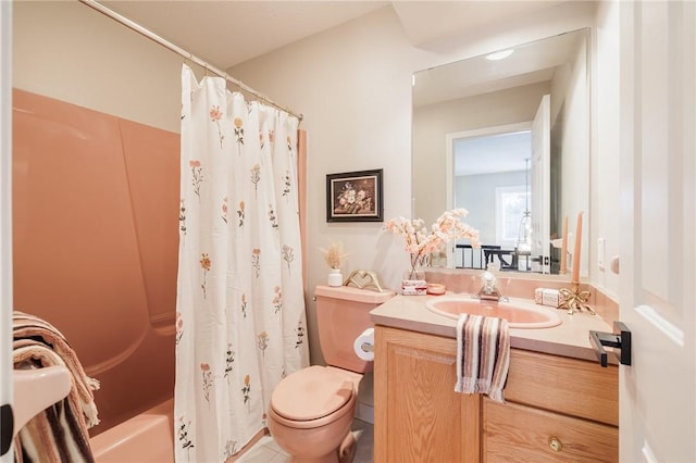 full bathroom with shower / tub combo, tile patterned floors, vanity, and toilet