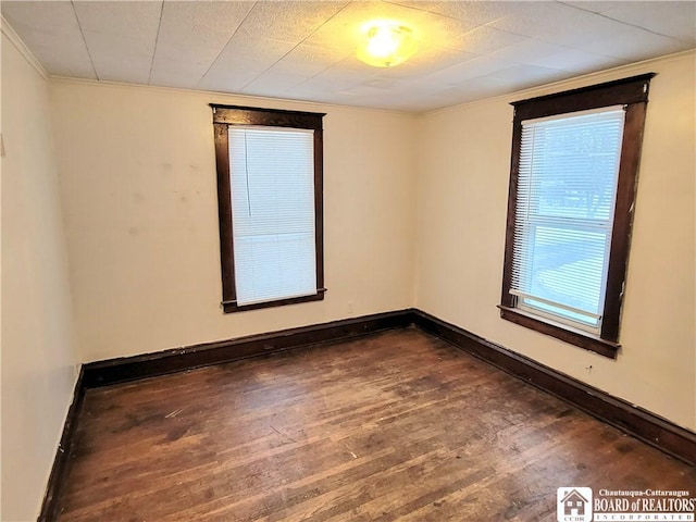 empty room featuring dark hardwood / wood-style floors