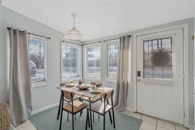 dining area with light tile patterned flooring