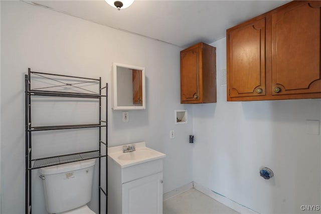 laundry area featuring sink and washer hookup