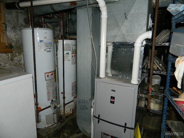 utility room featuring washer / clothes dryer and gas water heater