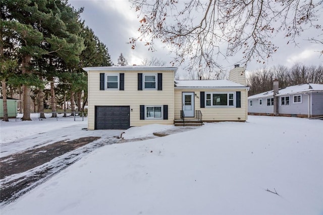 tri-level home with a garage