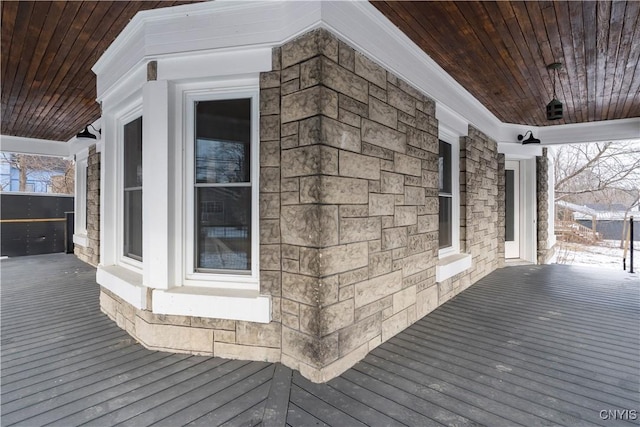 71 Church St, Alexandria, NY 13607 - wooden deck featuring covered porch
