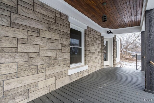 wooden terrace with a porch