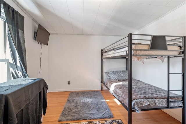 bedroom featuring hardwood / wood-style flooring