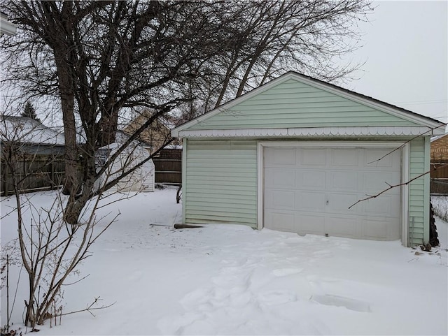 view of snow covered garage