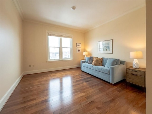 living room featuring ornamental molding and dark hardwood / wood-style floors