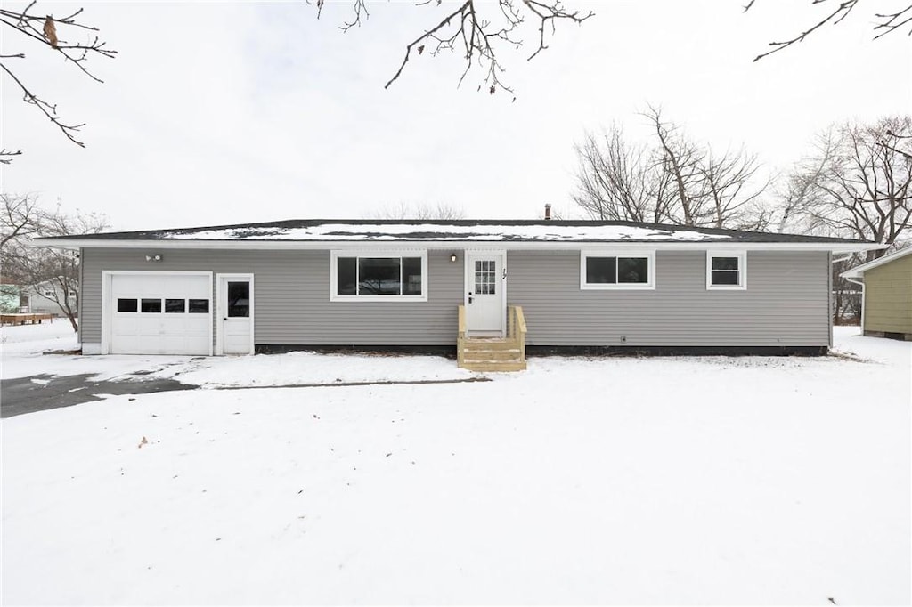 ranch-style home with a garage