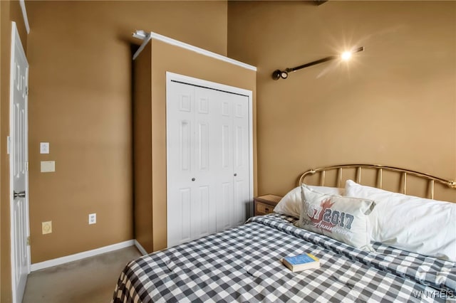 bedroom featuring a closet and carpet floors