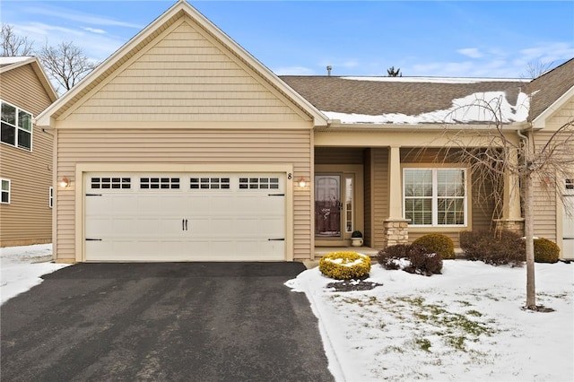 view of front of home with a garage