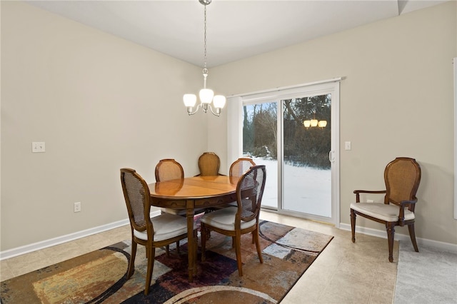 dining room with a chandelier