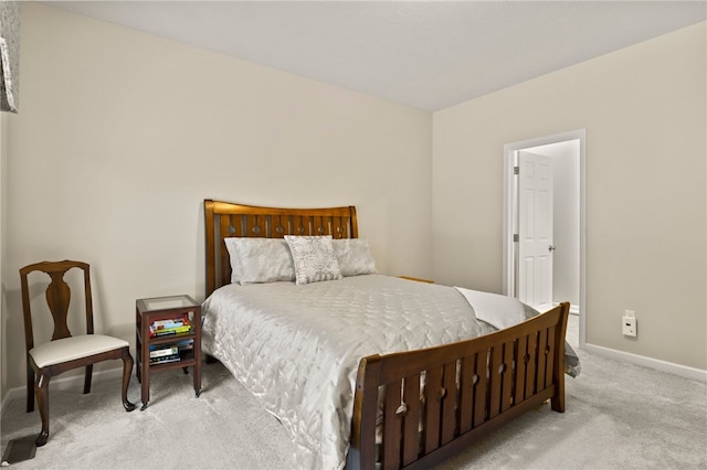 bedroom with light carpet